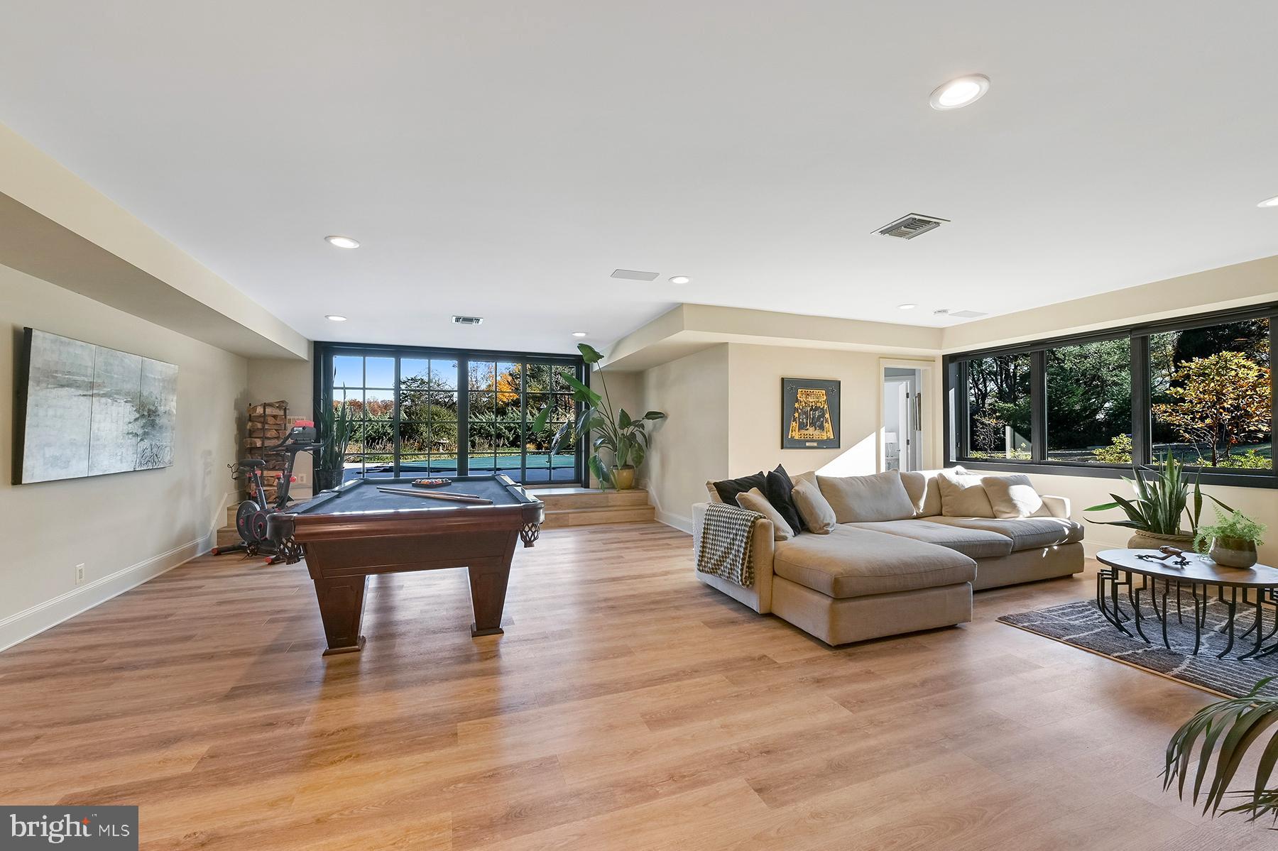 3333 Harness Creek Road Annapolis, MD 21403 - Photo 41 of 75 Super family room with more pool and natural views