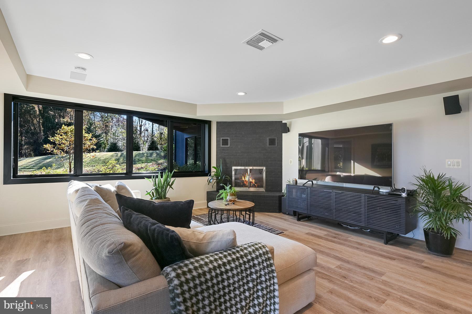 3333 Harness Creek Road Annapolis, MD 21403 - Photo 46 of 75 Wood-burning fireplace in the family room