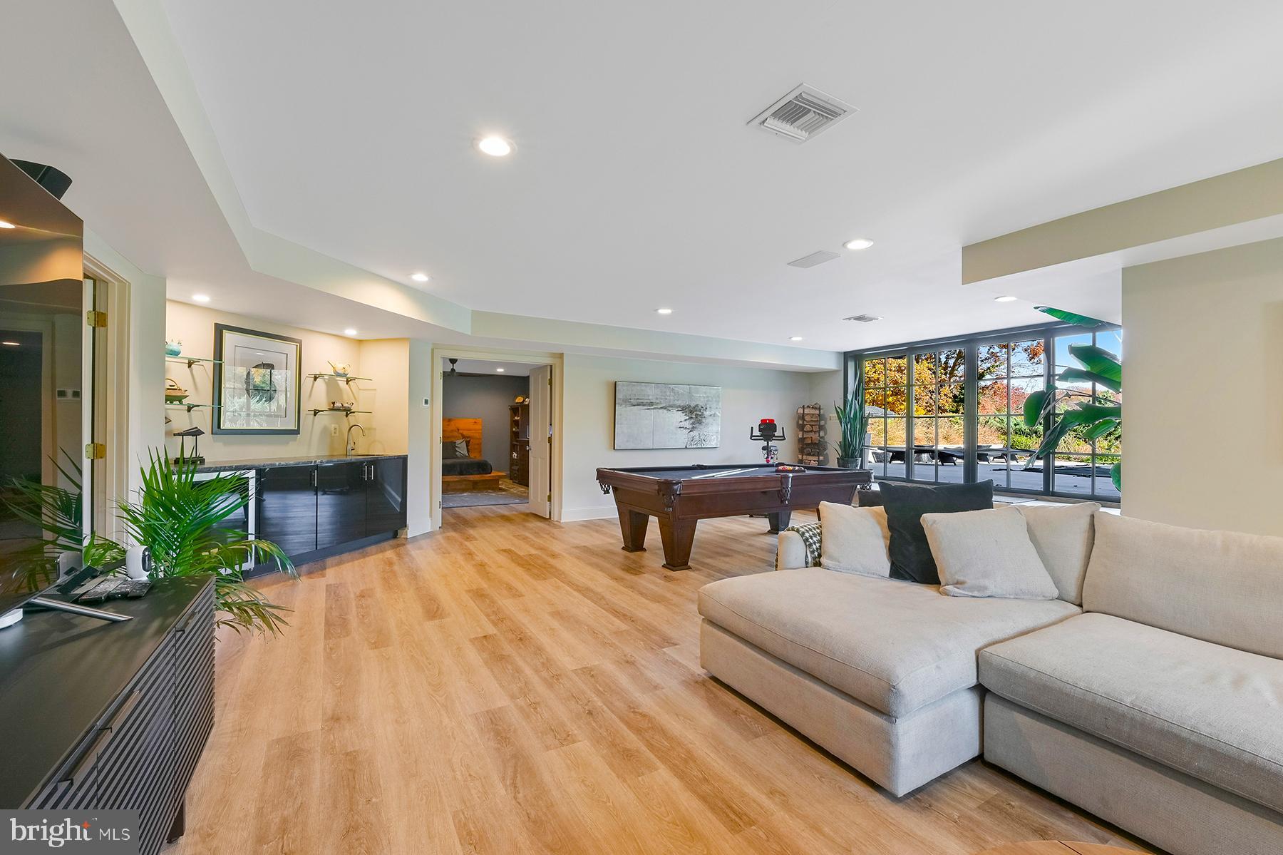 3333 Harness Creek Road Annapolis, MD 21403 - Photo 47 of 75 The family room provides direct access to the pool