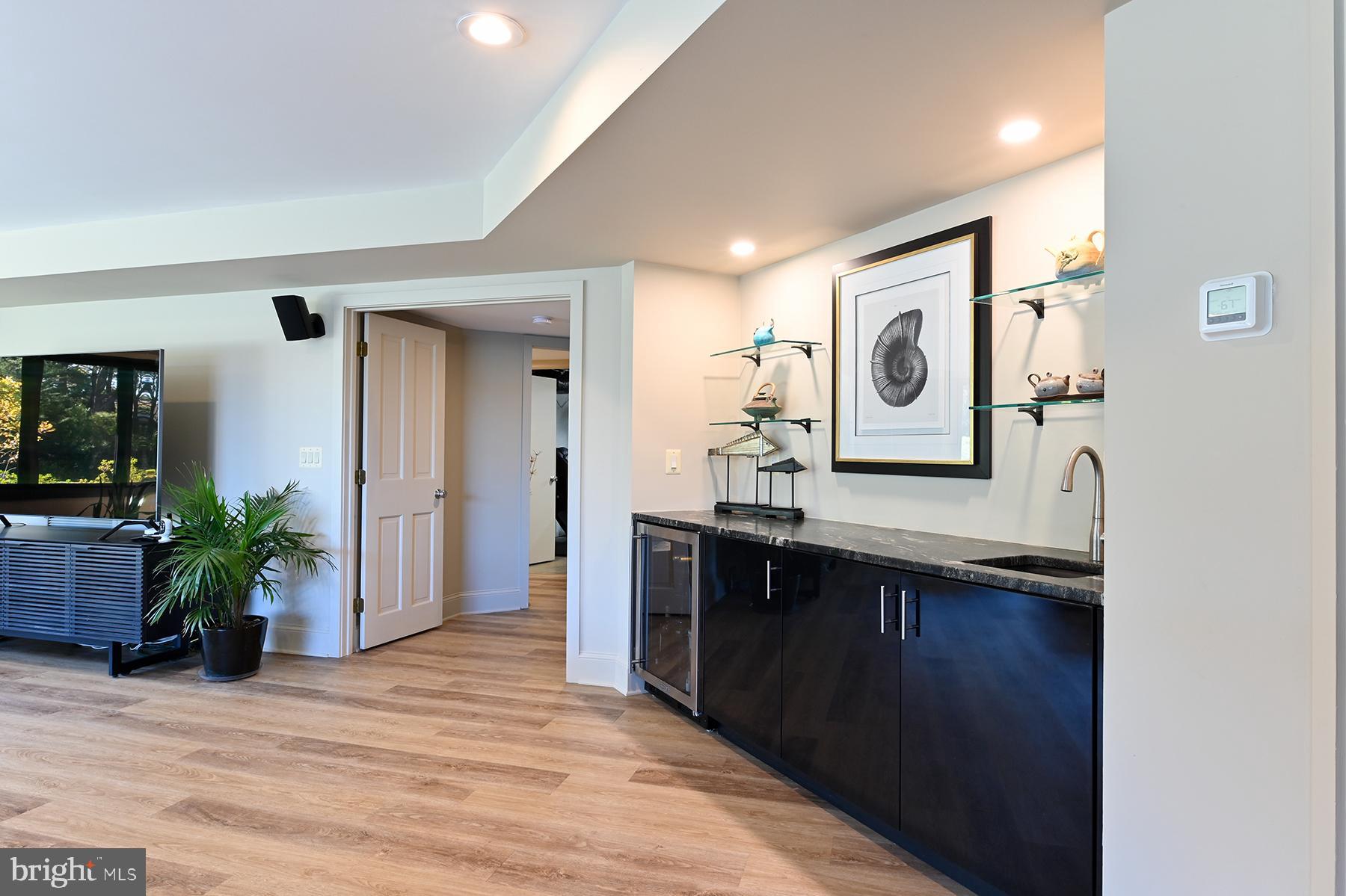 3333 Harness Creek Road Annapolis, MD 21403 - Photo 48 of 75 Wet bar with mini-fridge