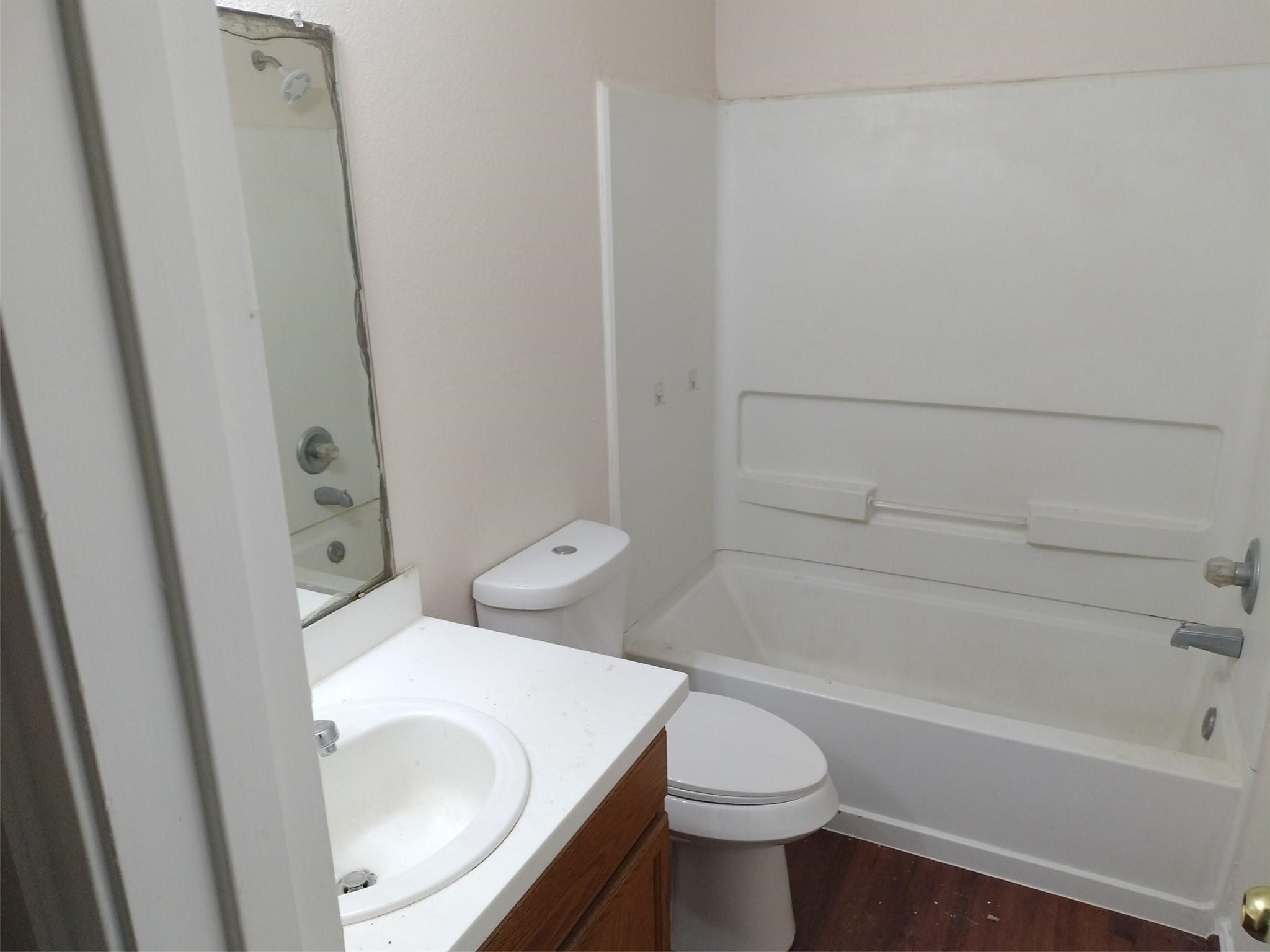 315 Sunset Colony Drive Rosharon, TX 77583 - Photo 18 of 20 a bathroom with a sink and toilet