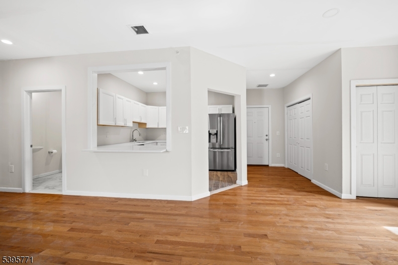 176 Union Avenue Rutherford, NJ 07070 - Photo 12 of 13 a view of empty room with wooden floor