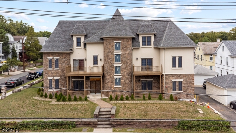 176 Union Avenue Rutherford, NJ 07070 - Photo 13 of 13 a front view of a house with lots of windows