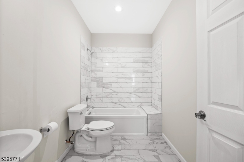 176 Union Avenue Rutherford, NJ 07070 - Photo 4 of 13 a bathroom with a toilet and a shower