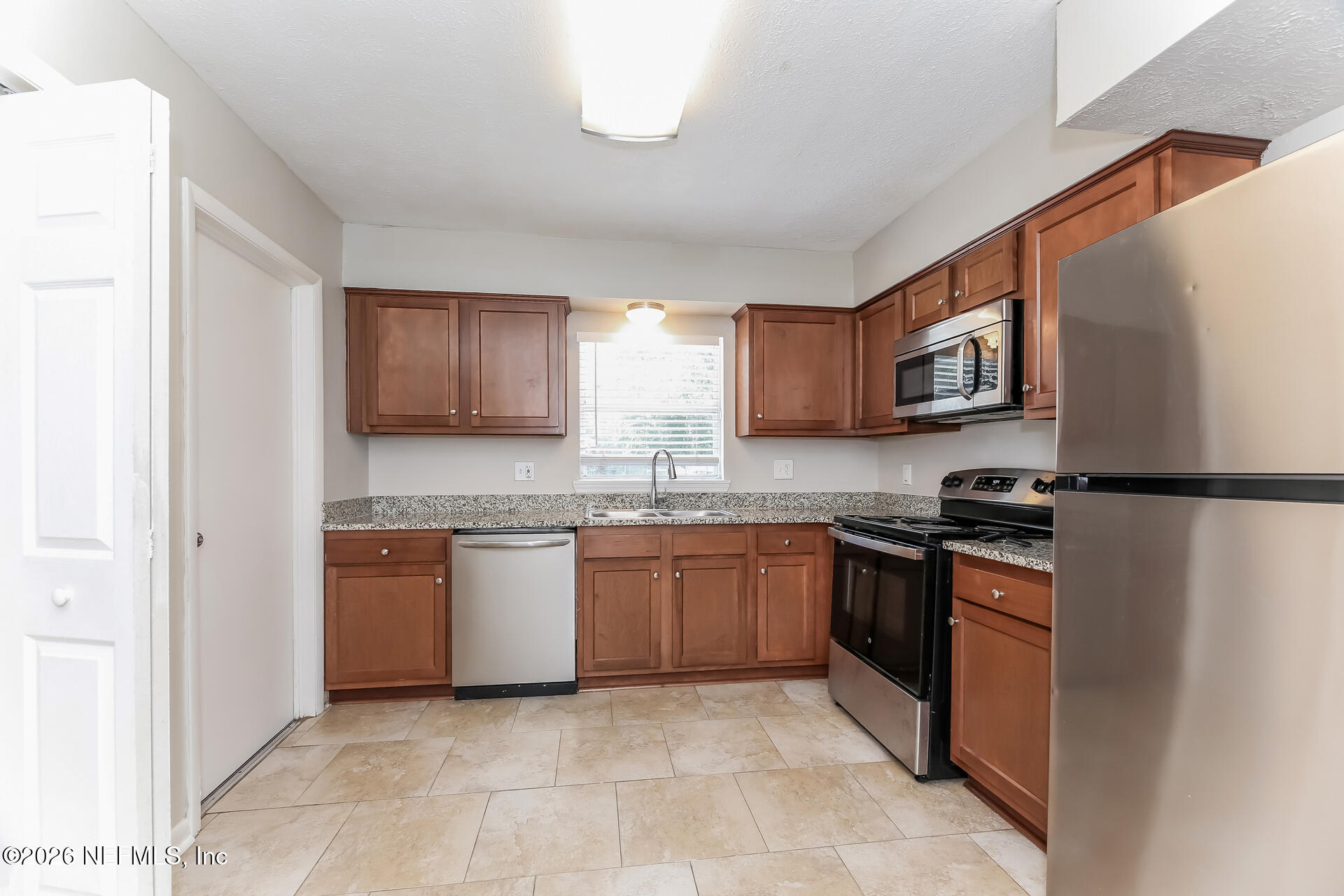 8251 Vermanth Road Jacksonville, FL 32211 - Photo 5 of 21 005-photo-kitchen-15517424