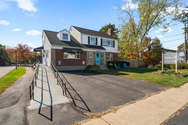 a house view with a garden space