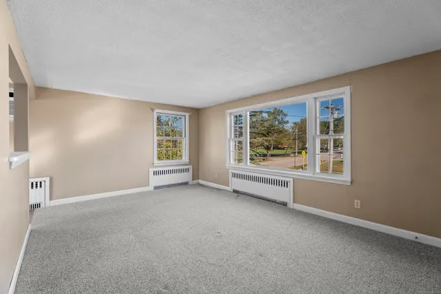 an empty room with windows