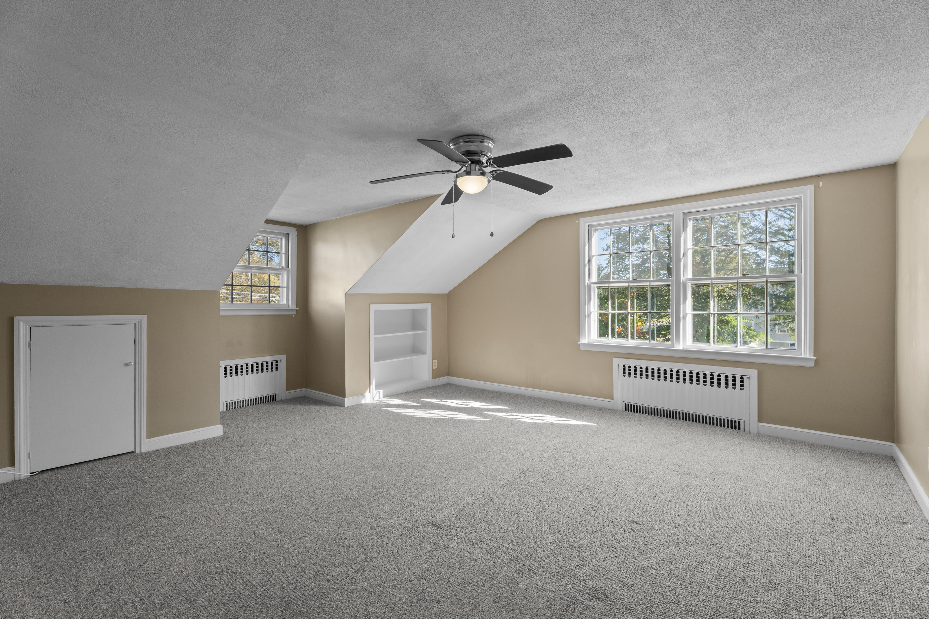 56 Norwich Avenue Colchester, CT 06415 - Photo 34 of 40 a view of an empty room with a window