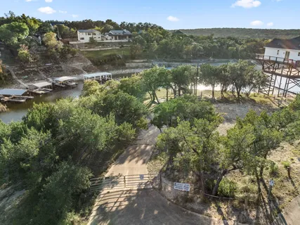 a aerial view of a house with a yard