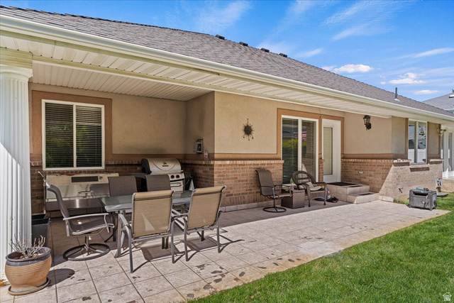 1924 North 2000th Street East Layton, UT 84040 - Photo 37 of 41 View of patio with an outdoor kitchen / dining area