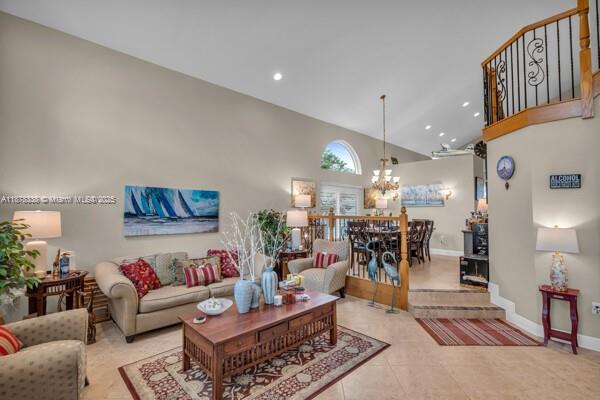 17794 Southwest 47th Street Miramar, FL 33029 - Photo 13 of 39 a living room with furniture and kitchen view
