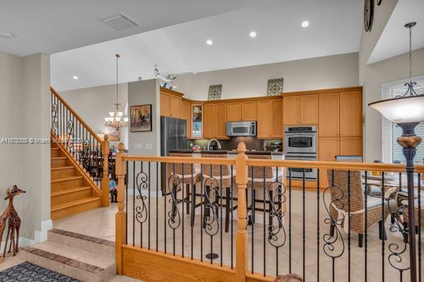17794 Southwest 47th Street Miramar, FL 33029 - Photo 17 of 39 a view of a hallway with wooden floor and staircase