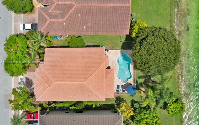 17794 Southwest 47th Street Miramar, FL 33029 - Photo 2 of 39 an aerial view of a house with a yard and a fountain