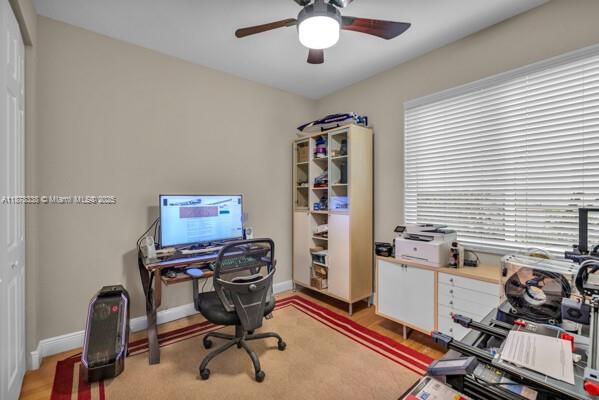 17794 Southwest 47th Street Miramar, FL 33029 - Photo 21 of 39 a view of a workspace with furniture and a window
