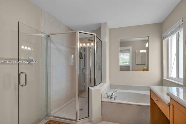 17794 Southwest 47th Street Miramar, FL 33029 - Photo 26 of 39 a bathroom with a tub shower and sink