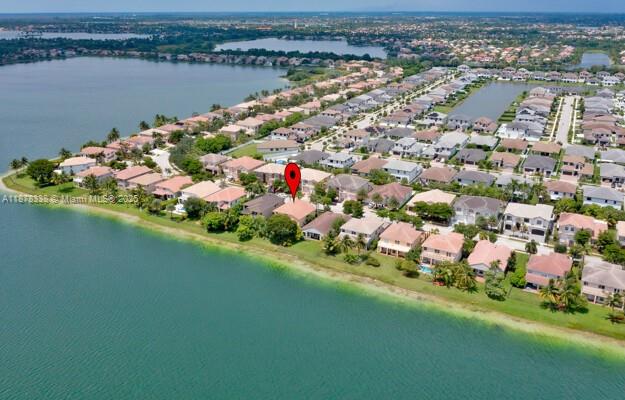 17794 Southwest 47th Street Miramar, FL 33029 - Photo 4 of 39 a view of a lake with outdoor space