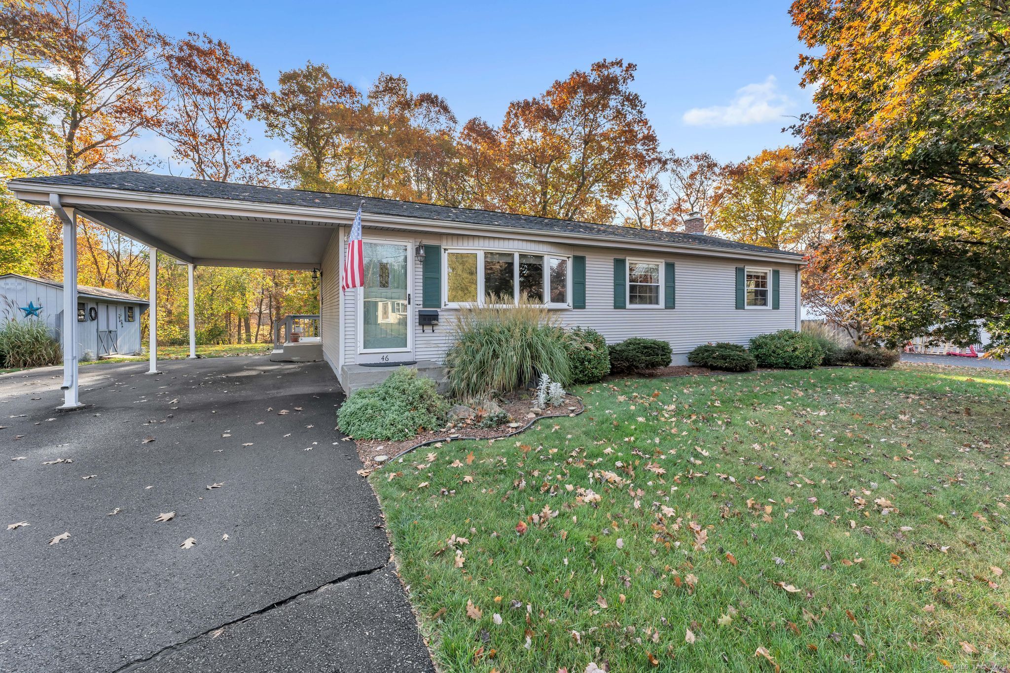 front view of a house with a yard