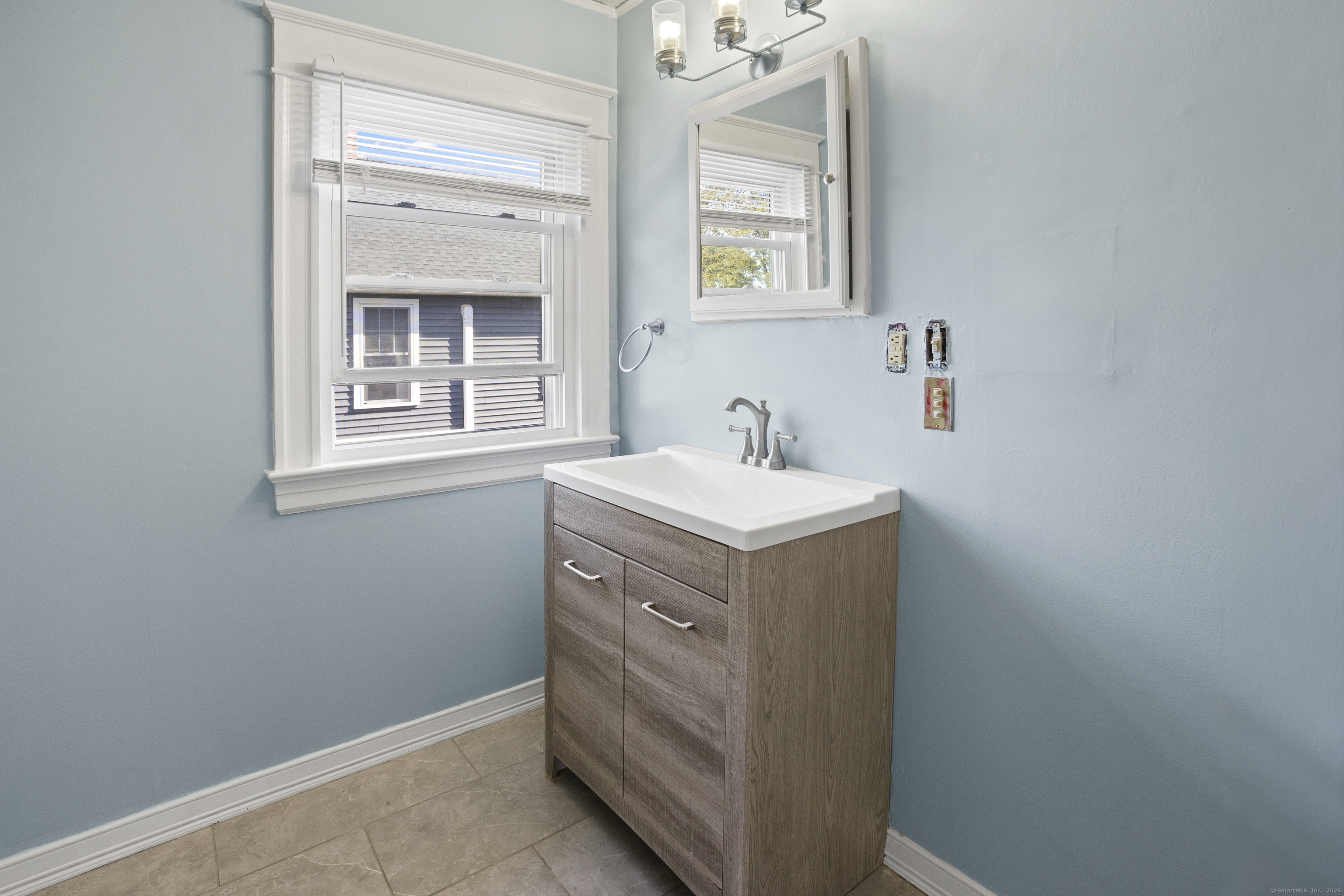 132 Grove Street Putnam, CT 06260 - Photo 26 of 36 a view of utility room and window