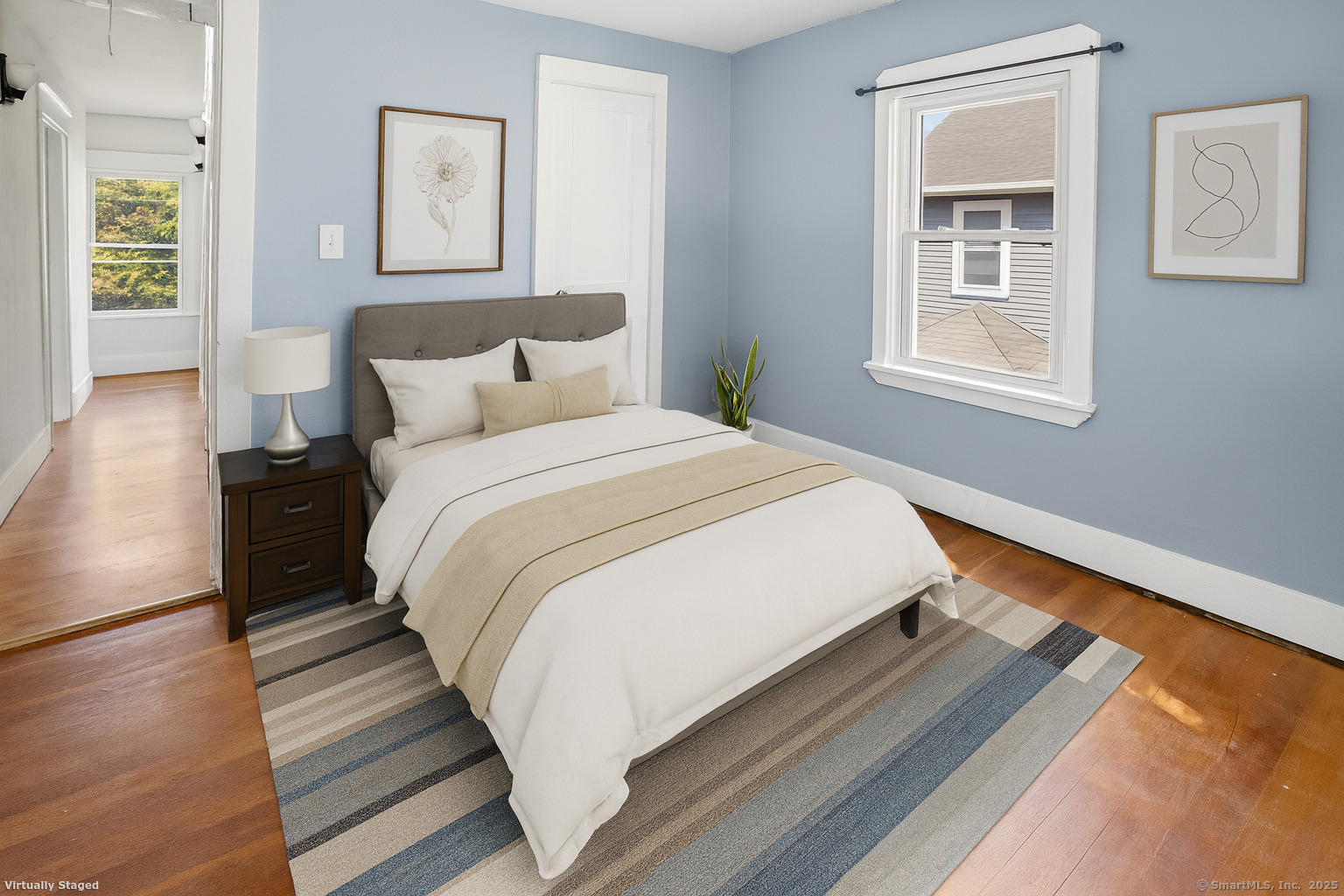 132 Grove Street Putnam, CT 06260 - Photo 33 of 36 a large bed sitting in a bedroom next to a window