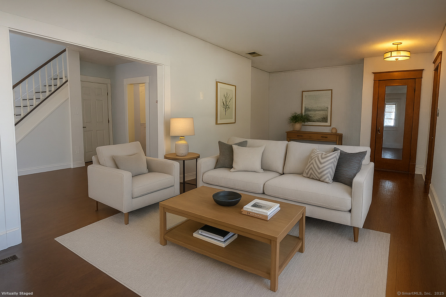 132 Grove Street Putnam, CT 06260 - Photo 8 of 36 a living room with furniture a couch and wooden floor