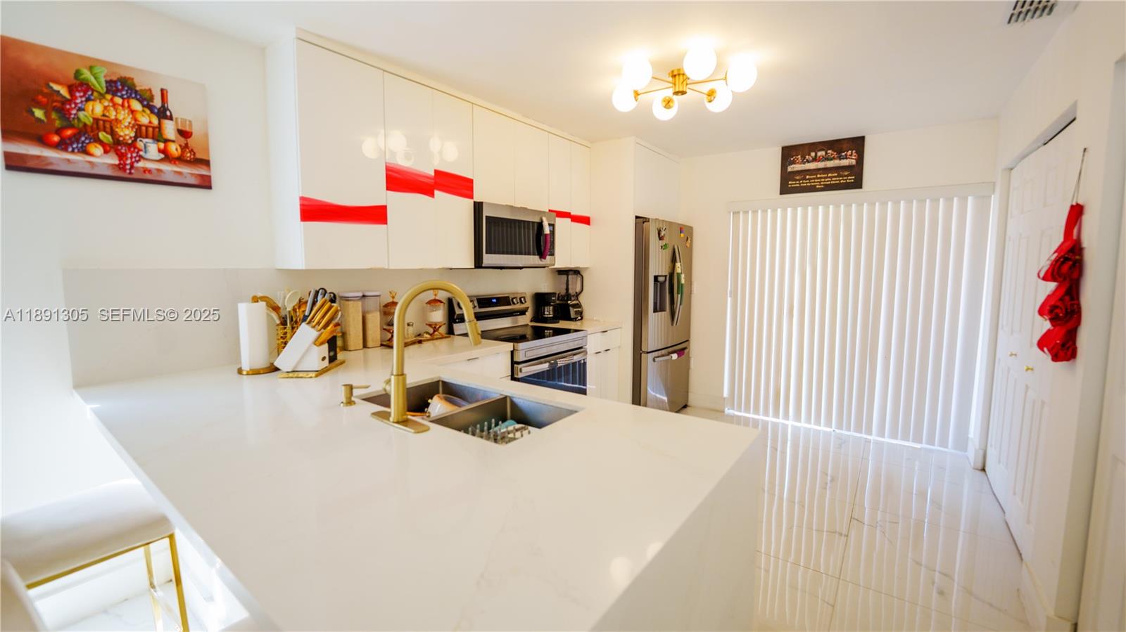 22226 Southwest 98th Place Cutler Bay, FL 33190 - Photo 16 of 29 a bedroom with furniture and a bed