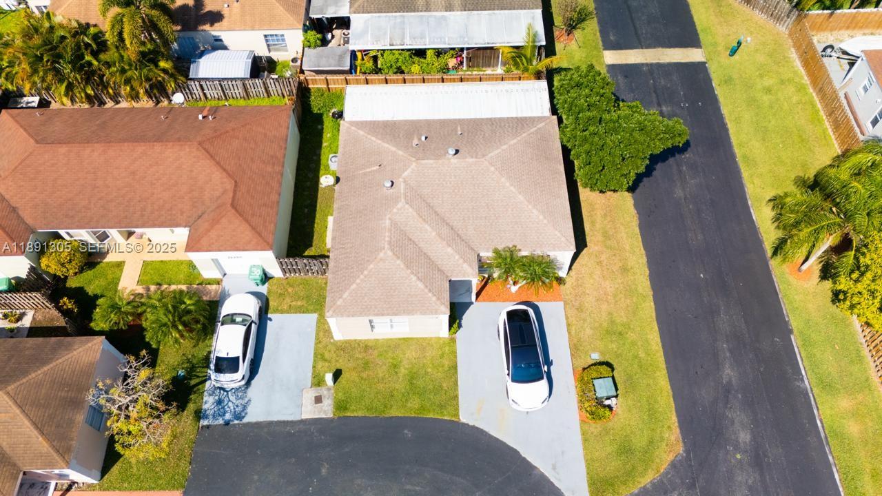 22226 Southwest 98th Place Cutler Bay, FL 33190 - Photo 8 of 29 an aerial view of a swimming pool