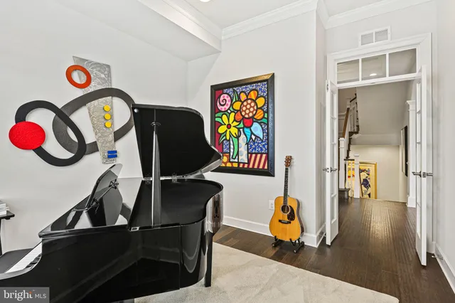 an open kitchen with stainless steel appliances granite countertop a stove and cabinets