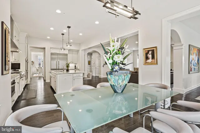 a view of entryway with wooden floor and stairs