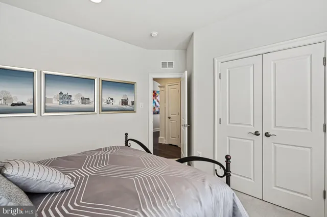 an aerial view of a house with a ocean view