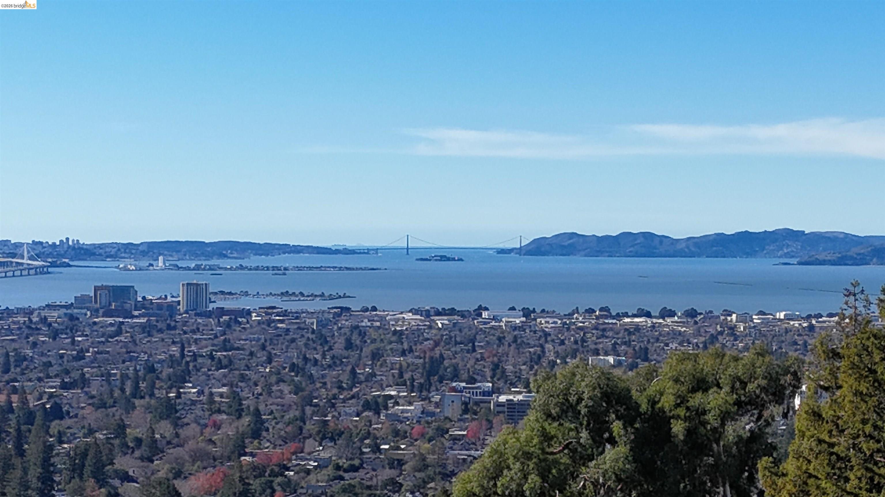 142 Gravatt Drive Berkeley, CA 94705 - Photo 15 of 25 Water view featuring a notable bridge and a mountain backdrop