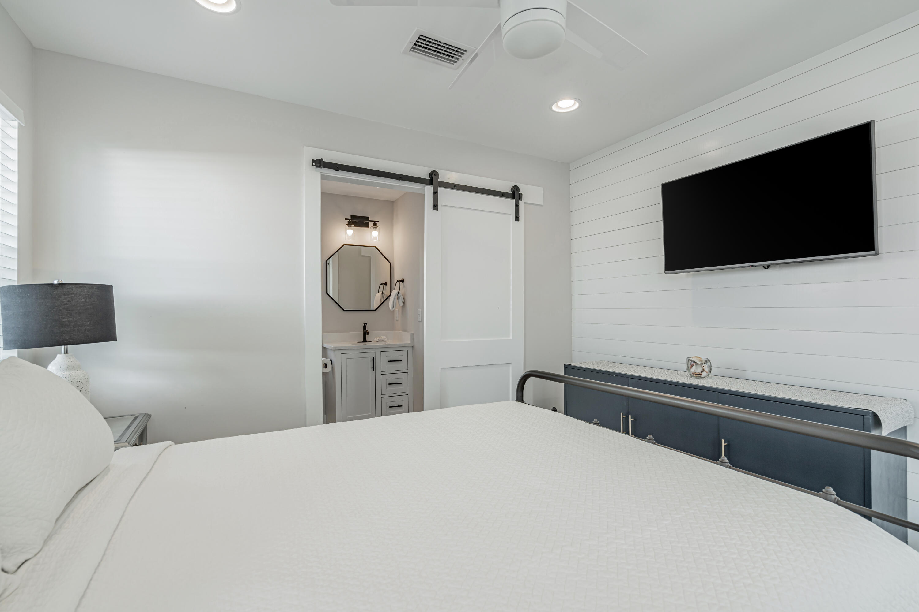41 Abbie Road Santa Rosa Beach, FL 32459 - Photo 23 of 38 a bedroom with a bed and a flat screen tv