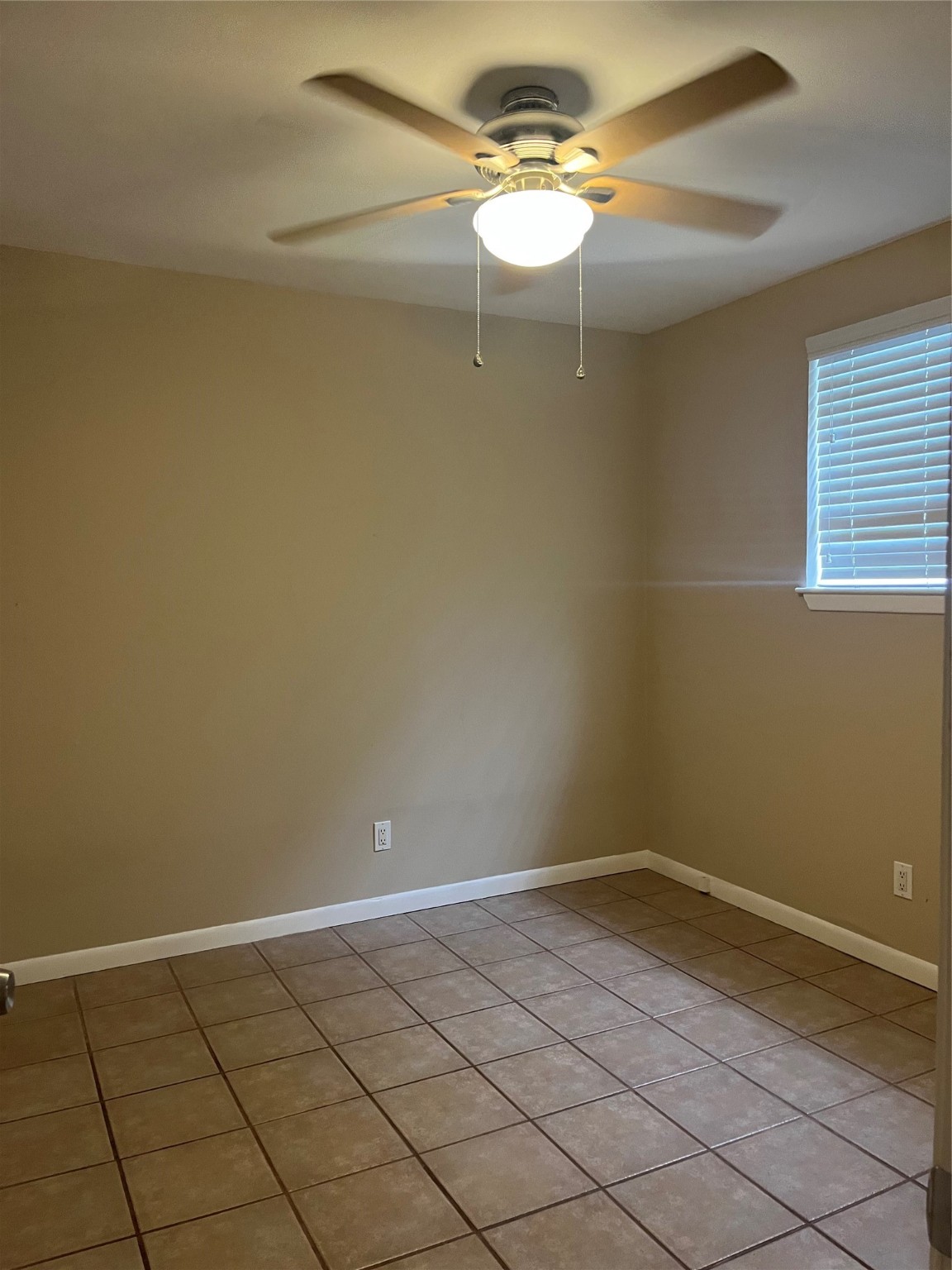 4010 Feagan Street, Unit 5 Houston, TX 77007 - Photo 22 of 24 a view of a room with a hanging light and kitchen view