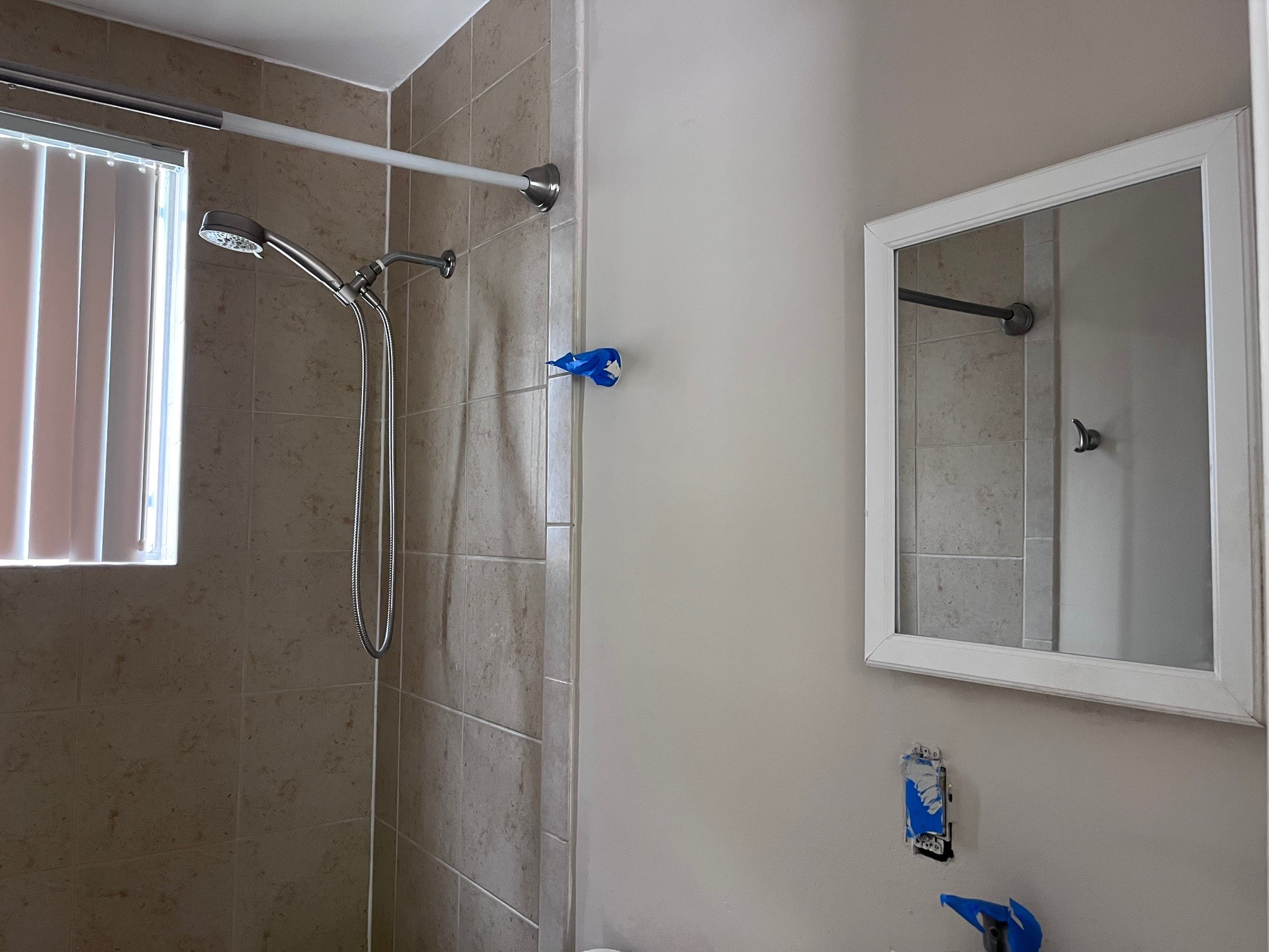 4010 Feagan Street, Unit 5 Houston, TX 77007 - Photo 4 of 24 a bathroom with a shower and a window