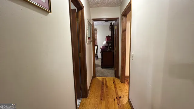 a view of a backyard with sitting area