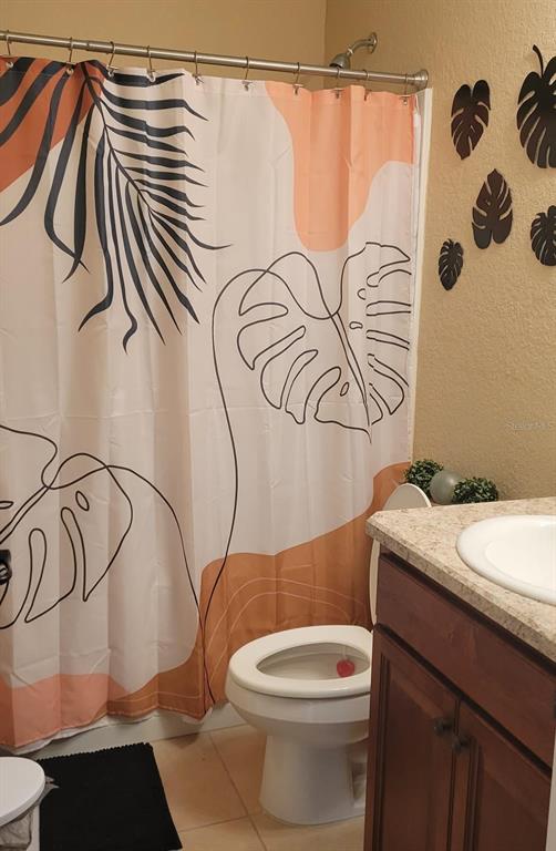 2523 Southwest 147 Place Road Ocala, FL 34473 - Photo 5 of 15 a bathroom with a granite countertop sink and a mirror
