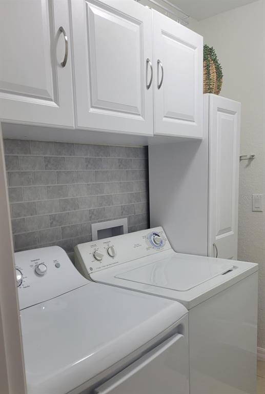 2523 Southwest 147 Place Road Ocala, FL 34473 - Photo 6 of 15 a utility room with dryer and washer