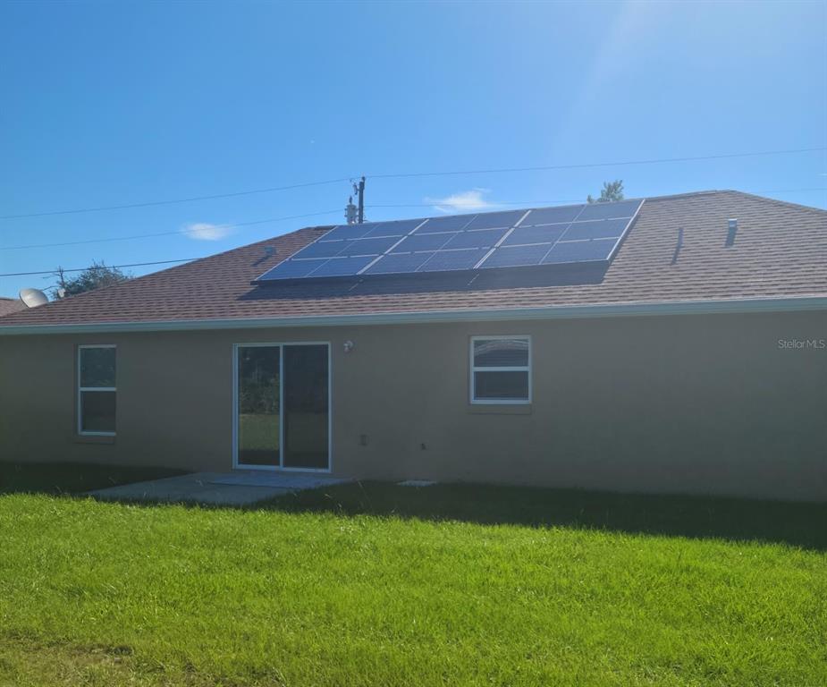 2523 Southwest 147 Place Road Ocala, FL 34473 - Photo 9 of 15 a front view of a house with garden