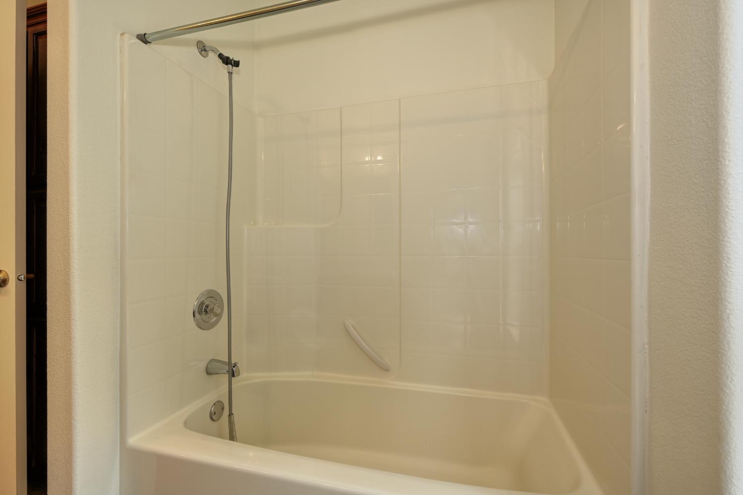 3680 Greenwood Road Garden Valley, CA 95633 - Photo 20 of 32 a close up of a bathtub curtain