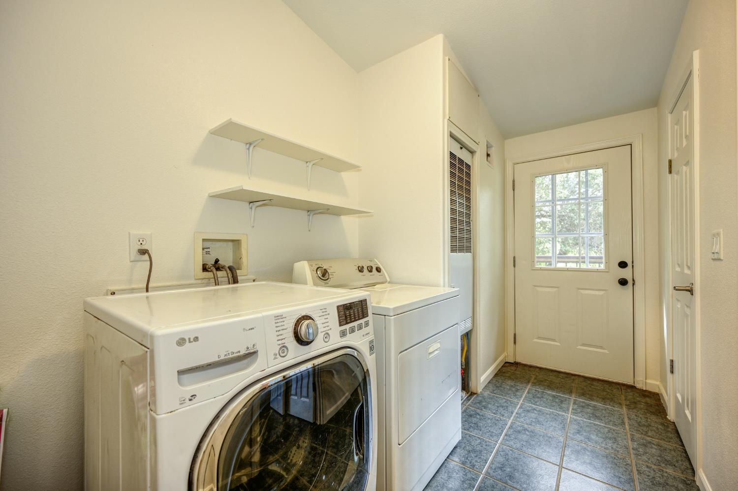 3680 Greenwood Road Garden Valley, CA 95633 - Photo 21 of 32 a utility room with dryer and washer