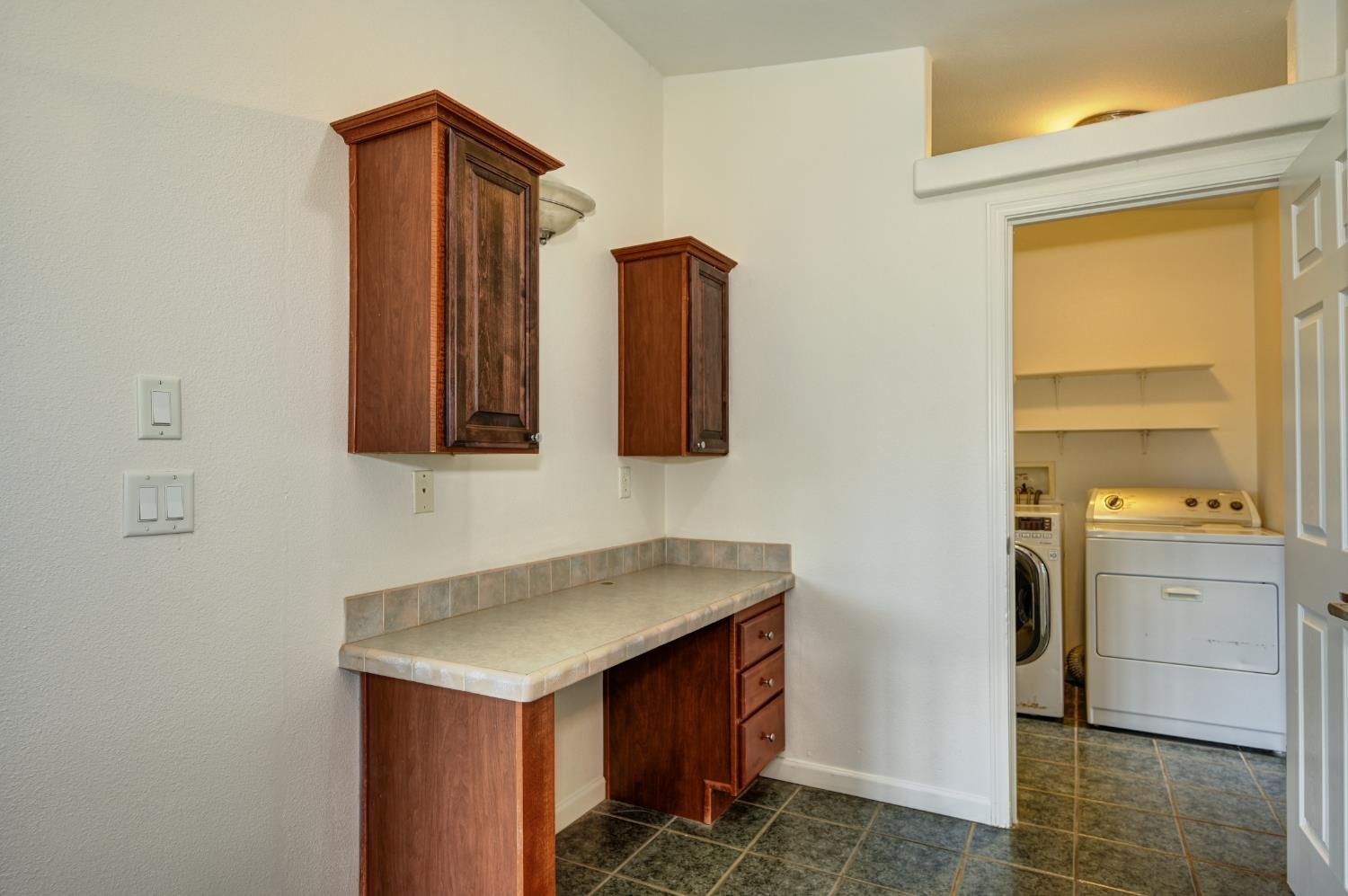 3680 Greenwood Road Garden Valley, CA 95633 - Photo 6 of 32 a utility room with washer and dryer