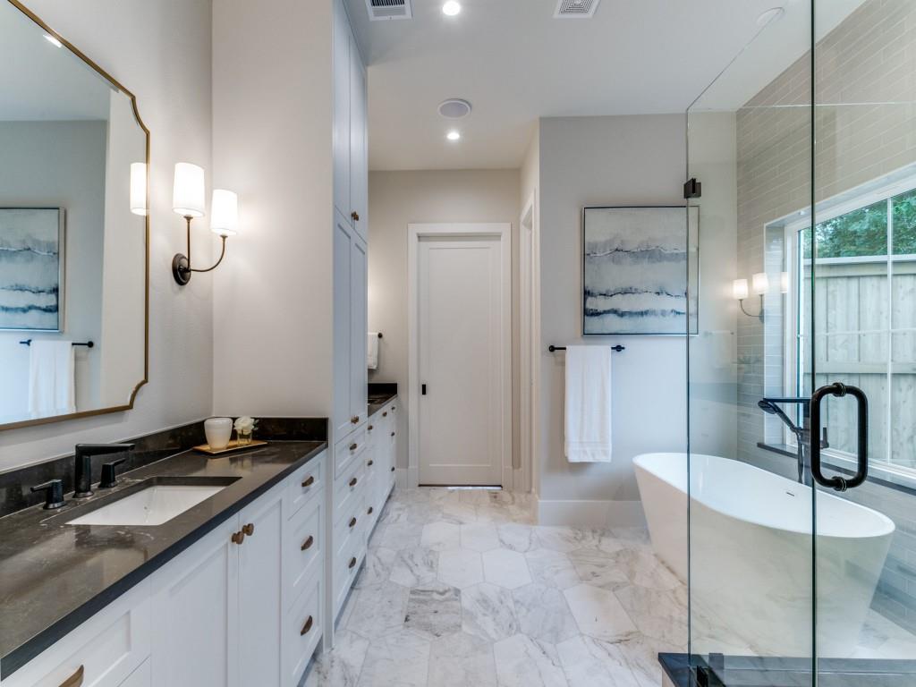 3911 Hawick Lane Dallas, TX 75220 - Photo 14 of 23 a bathroom with a granite countertop sink mirror and double