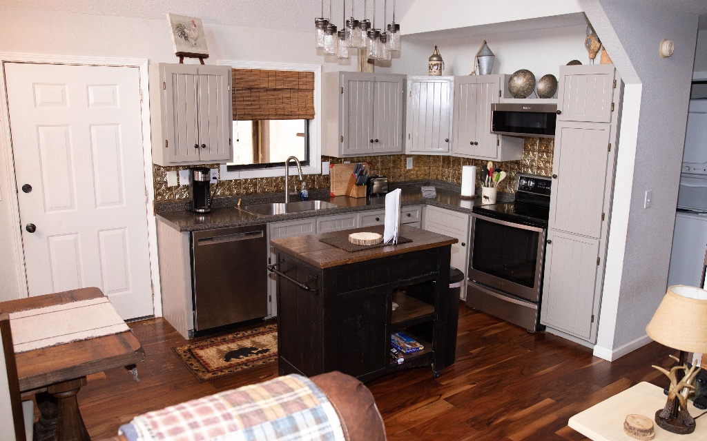 96 Indigo Ridge Murphy, NC 28906 - Photo 20 of 26 a kitchen with a sink appliances and cabinets