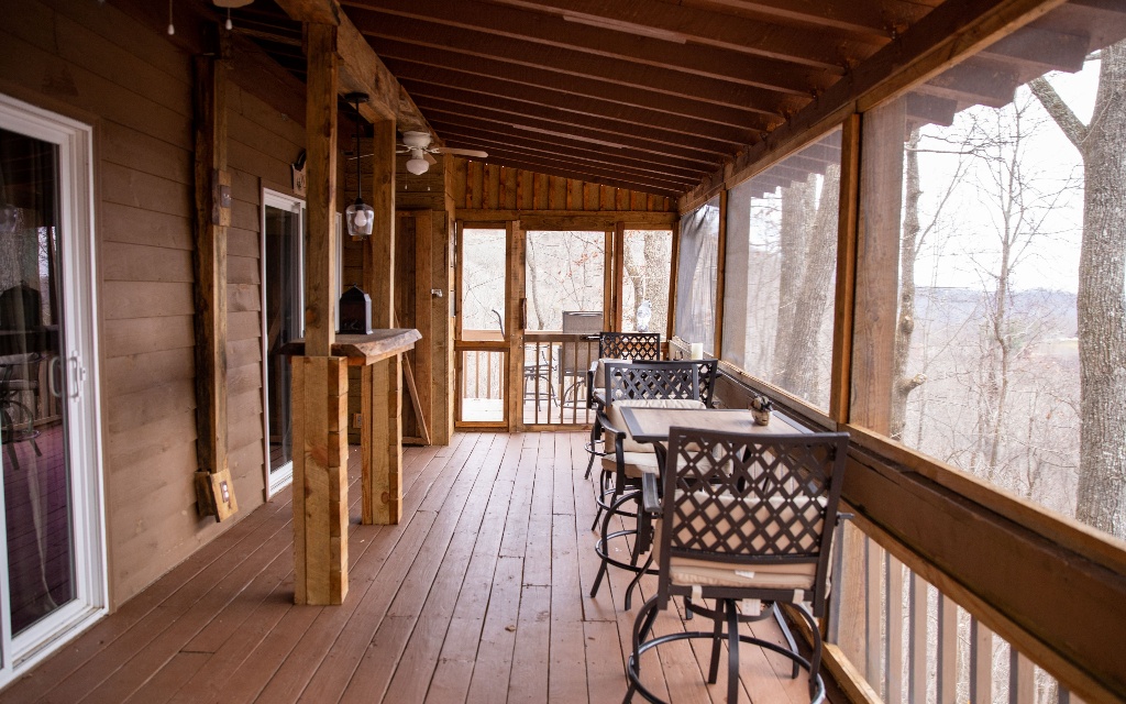 96 Indigo Ridge Murphy, NC 28906 - Photo 6 of 26 a view of a chairs and table in the balcony