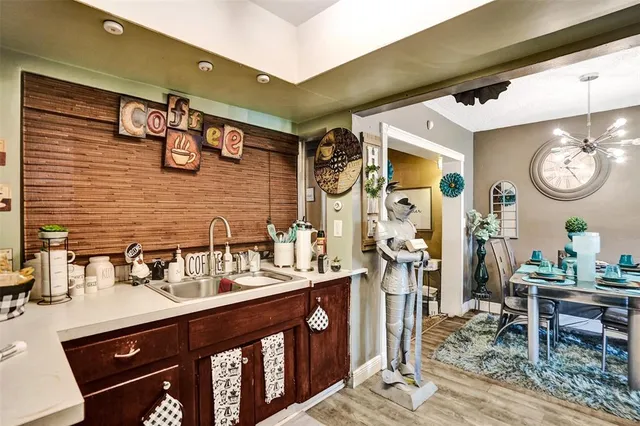 a bathroom with double vanity sink and a mirror