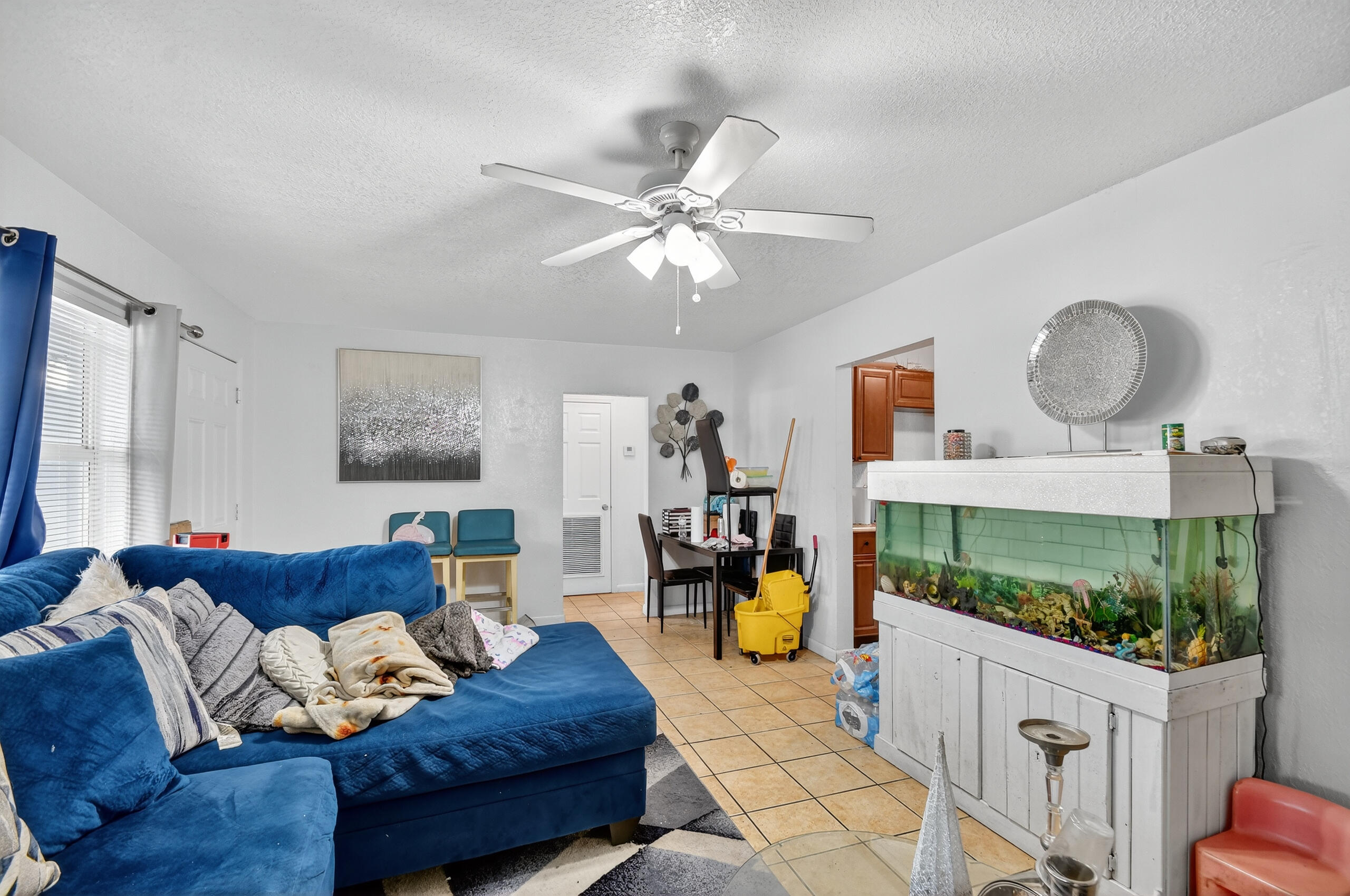 173 West 18th Street Riviera Beach, FL 33404 - Photo 10 of 28 a living room with furniture and wooden floor