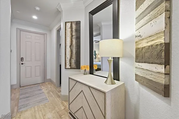 a view of living room with granite countertop furniture and a fireplace