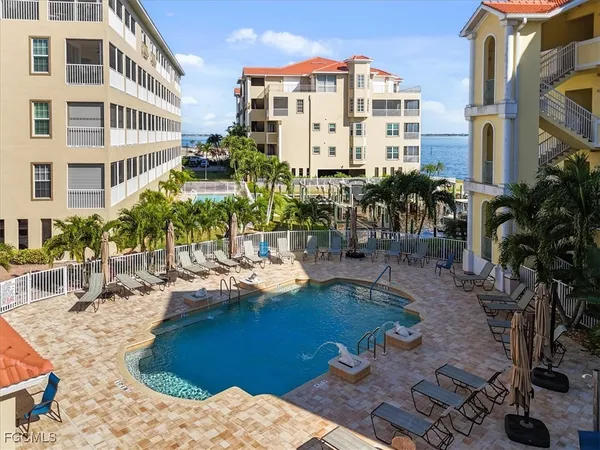 a view of a building with backyard