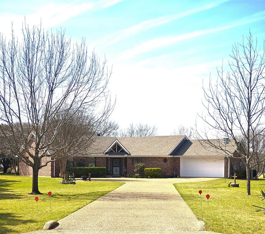 24008 Oak Shadow Whitney, TX 76692 - Photo 1 of 1 a house with swimming pool in front of it