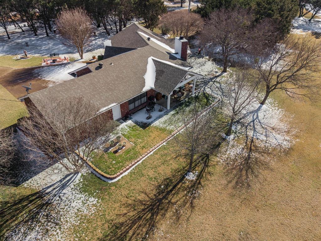 24008 Oak Shadow Whitney, TX 76692 - Photo 27 of 38 an aerial view of a house with a yard