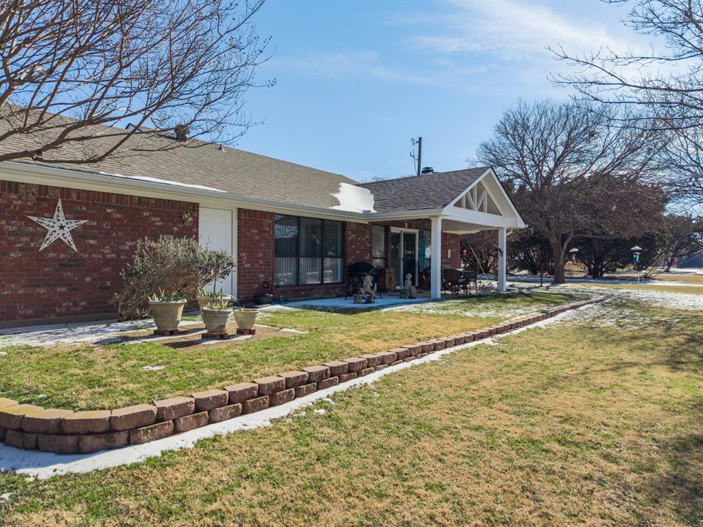 24008 Oak Shadow Whitney, TX 76692 - Photo 28 of 38 a view of a house with swimming pool and a yard